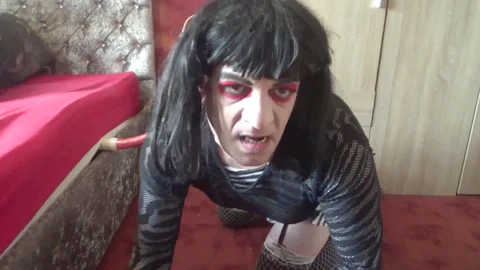 Amateur crossdresser Mark Wright enjoys anal play with a toy then gives it a sloppy suck