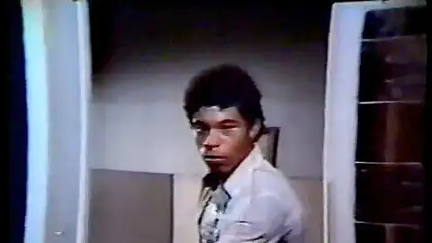 black dude with a gun plows women & a trans 1981