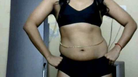 Desirable Indian CrossDresser teases in traditional attire, showing off her curves seductively
